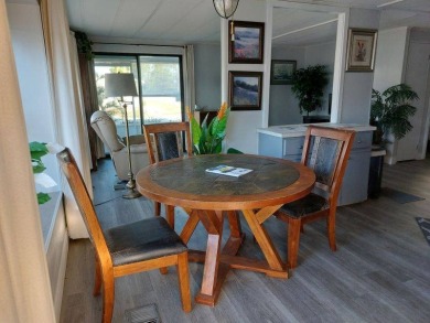 The Lot Rent for this home is $1,047.00/monthly. A cozy on Lake Fairways Country Club in Florida - for sale on GolfHomes.com, golf home, golf lot