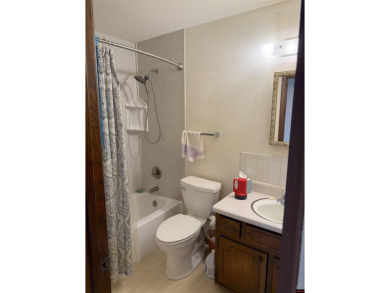 This charming 2-bedroom, 1-bath home is located in a peaceful on The Course At Turkey Mountain in Arkansas - for sale on GolfHomes.com, golf home, golf lot