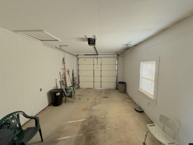 This charming 2-bedroom, 1-bath home is located in a peaceful on The Course At Turkey Mountain in Arkansas - for sale on GolfHomes.com, golf home, golf lot