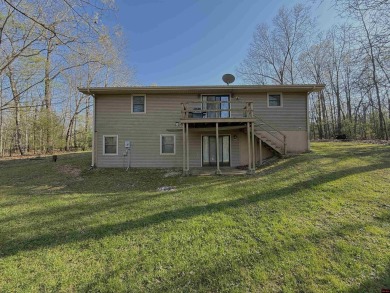 This charming 2-bedroom, 1-bath home is located in a peaceful on The Course At Turkey Mountain in Arkansas - for sale on GolfHomes.com, golf home, golf lot