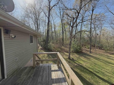 This charming 2-bedroom, 1-bath home is located in a peaceful on The Course At Turkey Mountain in Arkansas - for sale on GolfHomes.com, golf home, golf lot