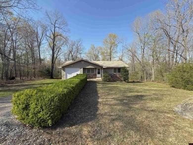 This charming 2-bedroom, 1-bath home is located in a peaceful on The Course At Turkey Mountain in Arkansas - for sale on GolfHomes.com, golf home, golf lot