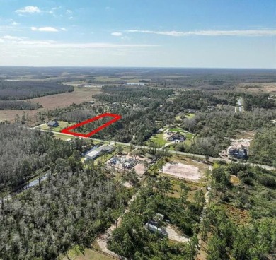 RARE FIND! Escape the ordinary and DISCOVER 2.17 ACRES OF PRIME on Wedgefield Golf Club in Florida - for sale on GolfHomes.com, golf home, golf lot