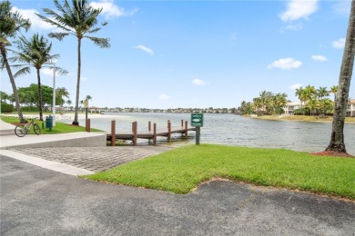 Upscale living in the heart of Doral Isles! This incredible on Jim McLean Signature Course in Florida - for sale on GolfHomes.com, golf home, golf lot