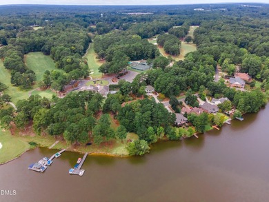 Enjoy lakefront living with peaceful water views and on Carolina Trace Country Club in North Carolina - for sale on GolfHomes.com, golf home, golf lot