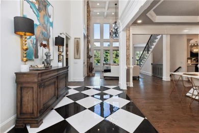 Privately tucked behind a long, tree-lined driveway and greeted on Chateau Elan Golf Club  in Georgia - for sale on GolfHomes.com, golf home, golf lot