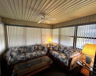 This delightful 2-bedroom, 2-bathroom retreat boasts a generous on Lake Henry Golf Club in Florida - for sale on GolfHomes.com, golf home, golf lot