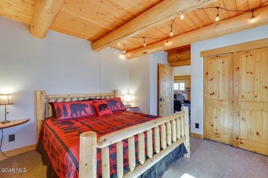 Tucked in the heart of Granby, this enchanting log cabin on Grand Elk Ranch and Club in Colorado - for sale on GolfHomes.com, golf home, golf lot