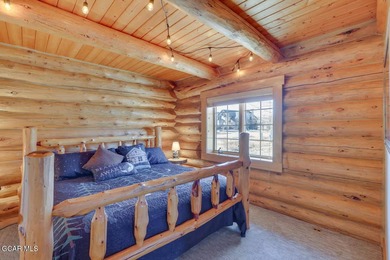 Tucked in the heart of Granby, this enchanting log cabin on Grand Elk Ranch and Club in Colorado - for sale on GolfHomes.com, golf home, golf lot