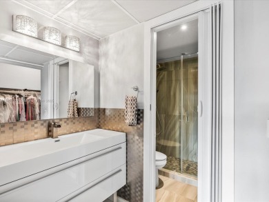 In the heart of Hallandale Beach, fall in love with this on The Diplomat Golf Resort and Spa in Florida - for sale on GolfHomes.com, golf home, golf lot