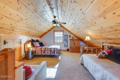 Tucked in the heart of Granby, this enchanting log cabin on Grand Elk Ranch and Club in Colorado - for sale on GolfHomes.com, golf home, golf lot