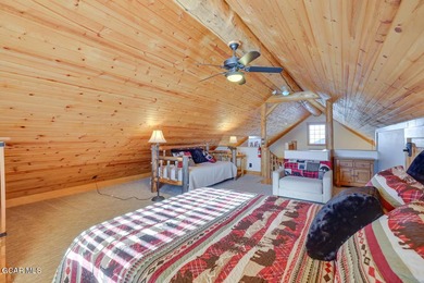 Tucked in the heart of Granby, this enchanting log cabin on Grand Elk Ranch and Club in Colorado - for sale on GolfHomes.com, golf home, golf lot