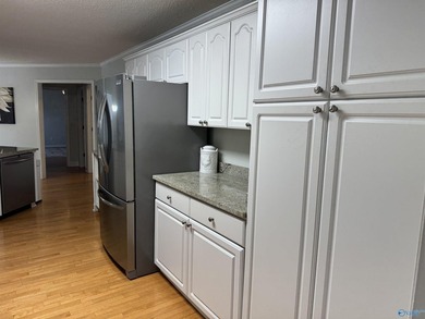 Welcome to this stunning 4 bedroom, 2.5 bathroom full brick home on Cherokee Country Club in Alabama - for sale on GolfHomes.com, golf home, golf lot