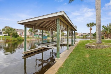 Escape To Waterfront Paradise In Palm Coast's Coveted C-section on Palm Harbor Golf Club in Florida - for sale on GolfHomes.com, golf home, golf lot