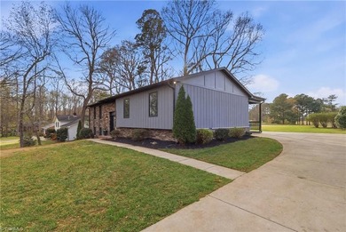 Enjoy front row golf course views from this well maintained on Forest Oaks Country Club in North Carolina - for sale on GolfHomes.com, golf home, golf lot