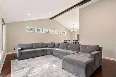 Enjoy front row golf course views from this well maintained on Forest Oaks Country Club in North Carolina - for sale on GolfHomes.com, golf home, golf lot