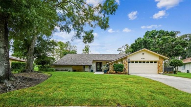 Welcome to your forever home located in the sought-after on Carrollwood Country Club in Florida - for sale on GolfHomes.com, golf home, golf lot