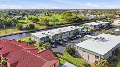 Tastefully renovated split 2 bed 2 bath second floor condo with on Hibiscus Golf Club in Florida - for sale on GolfHomes.com, golf home, golf lot