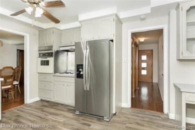 Meticulously maintained brick Ranch on a double lot in South on Western Golf and Country Club in Michigan - for sale on GolfHomes.com, golf home, golf lot