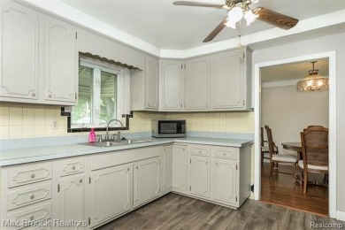Meticulously maintained brick Ranch on a double lot in South on Western Golf and Country Club in Michigan - for sale on GolfHomes.com, golf home, golf lot