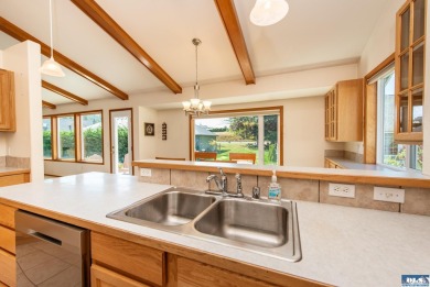 Experience true comfort in this custom single-level home on SunLand Golf and Country Club in Washington - for sale on GolfHomes.com, golf home, golf lot