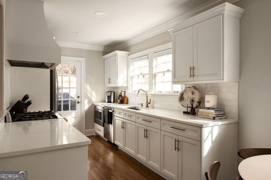 This beautifully renovated Lake Claire bungalow blends classic on Candler Park Golf Course in Georgia - for sale on GolfHomes.com, golf home, golf lot