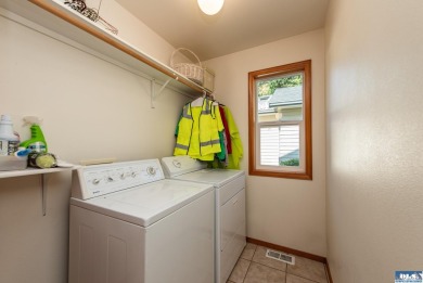 Experience true comfort in this custom single-level home on SunLand Golf and Country Club in Washington - for sale on GolfHomes.com, golf home, golf lot