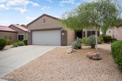 Resort-style living in one of Sun City Grand's most sought-after on Sun City Grand Golf Couse and Club in Arizona - for sale on GolfHomes.com, golf home, golf lot