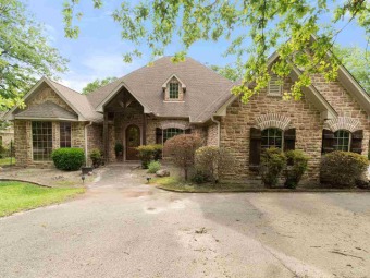 Beautiful custom golf course home in the private gated community on Holly Lake Ranch Golf Club in Texas - for sale on GolfHomes.com, golf home, golf lot