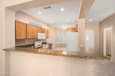 Resort-style living in one of Sun City Grand's most sought-after on Sun City Grand Golf Couse and Club in Arizona - for sale on GolfHomes.com, golf home, golf lot