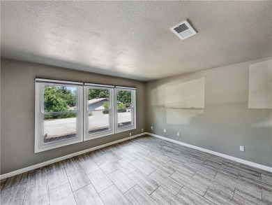 Welcome To Your Next Home! This Updated End-Unit Townhome In on Bella Vista Country Club and Golf Course in Arkansas - for sale on GolfHomes.com, golf home, golf lot