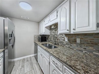 Welcome To Your Next Home! This Updated End-Unit Townhome In on Bella Vista Country Club and Golf Course in Arkansas - for sale on GolfHomes.com, golf home, golf lot