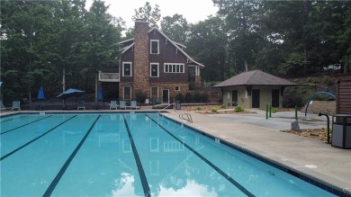 Nestled within the prestigious Chestatee Golf Club community on on Chestatee Golf Club in Georgia - for sale on GolfHomes.com, golf home, golf lot