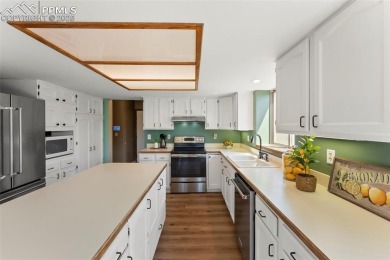 Nestled on a serene cul-de-sac and backing to open space, this on Woodmoor Pines Country Club in Colorado - for sale on GolfHomes.com, golf home, golf lot