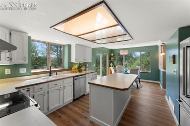 Nestled on a serene cul-de-sac and backing to open space, this on Woodmoor Pines Country Club in Colorado - for sale on GolfHomes.com, golf home, golf lot