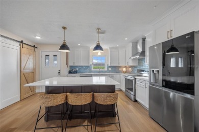 PRIME PGI WATERFRONT LOCATION! BEAUTIFULLY REMODELED 2 BEDROOM on Saint Andrews South Golf Club in Florida - for sale on GolfHomes.com, golf home, golf lot