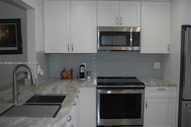 One of the most beautifully designed THREE BEDROOM and TWO on Inverrary Country Club in Florida - for sale on GolfHomes.com, golf home, golf lot