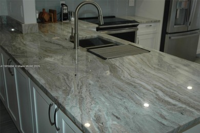 One of the most beautifully designed THREE BEDROOM and TWO on Inverrary Country Club in Florida - for sale on GolfHomes.com, golf home, golf lot