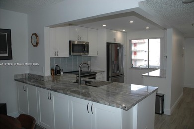 One of the most beautifully designed THREE BEDROOM and TWO on Inverrary Country Club in Florida - for sale on GolfHomes.com, golf home, golf lot