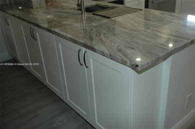 One of the most beautifully designed THREE BEDROOM and TWO on Inverrary Country Club in Florida - for sale on GolfHomes.com, golf home, golf lot