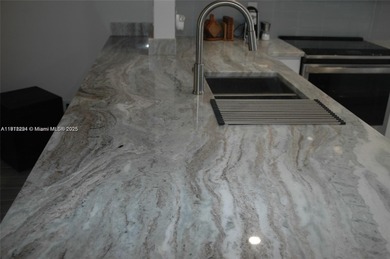 One of the most beautifully designed THREE BEDROOM and TWO on Inverrary Country Club in Florida - for sale on GolfHomes.com, golf home, golf lot