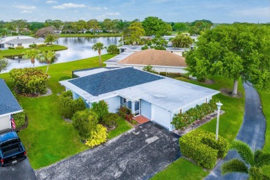 Welcome to your lakeside oasis in Eastpointe Country Club! This on Eastpointe Country Club in Florida - for sale on GolfHomes.com, golf home, golf lot