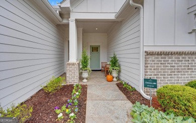 DUNWOODY Model  Covered front porch with brick elevation.  This on Chateau Elan Golf Club  in Georgia - for sale on GolfHomes.com, golf home, golf lot