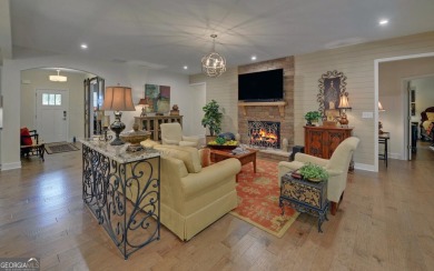 DUNWOODY Model  Covered front porch with brick elevation.  This on Chateau Elan Golf Club  in Georgia - for sale on GolfHomes.com, golf home, golf lot