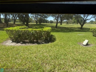 1st floor unit.  Larger one bedroom.  Vinyl flooring throughout on  in Florida - for sale on GolfHomes.com, golf home, golf lot