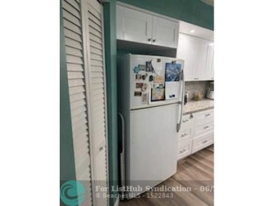 1st floor unit.  Larger one bedroom.  Vinyl flooring throughout on  in Florida - for sale on GolfHomes.com, golf home, golf lot