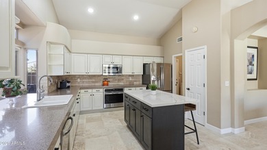 This beautiful single-story 3-bed + den, 2.5-bath home with a on The Foothills Golf Club in Arizona - for sale on GolfHomes.com, golf home, golf lot