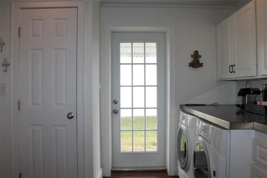 Welcome to this stunning and updated Ebbtide model home on Mainlands Golf Club in Florida - for sale on GolfHomes.com, golf home, golf lot