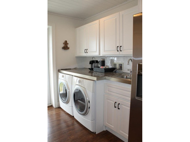 Welcome to this stunning and updated Ebbtide model home on Mainlands Golf Club in Florida - for sale on GolfHomes.com, golf home, golf lot