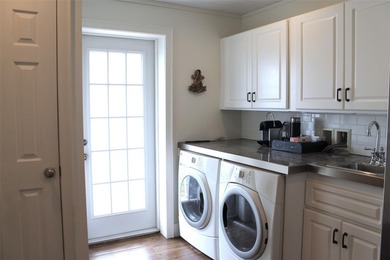 Welcome to this stunning and updated Ebbtide model home on Mainlands Golf Club in Florida - for sale on GolfHomes.com, golf home, golf lot